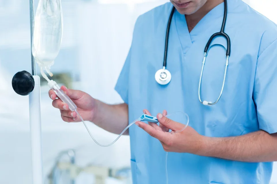 IV Nutrition Therapy Parenteral TPN PPN Doctor Checking IV